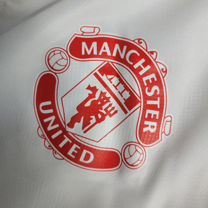 Jaqueta Corta Vento Manchester United 2023 Masculina (Sob encomenda)